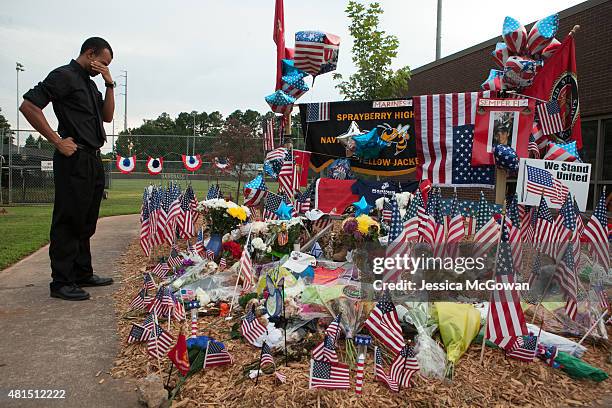 Justin Vidicon, a high school friend of Lance Cpl. Skip Wells, reflects for a moment at a memorial site for the fallen Marine at Sprayberry High...