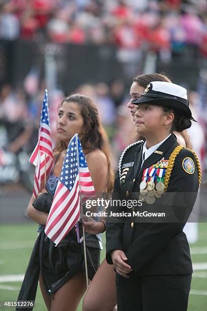 Ana Vasquez , a high school friend and ROTC member with Lance Cpl. Skip Wells, cries during his memorial at Sprayberry High School on July 21, 2015...