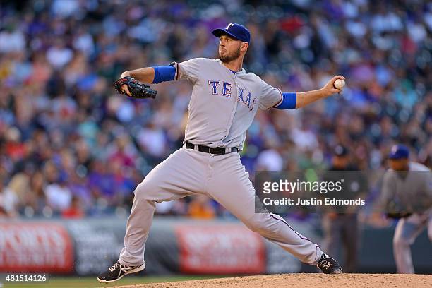 Starting pitcher Matt Harrison of the Texas Rangers delivers to home plate in the second inning against the Colorado Rockies during Interleague play...