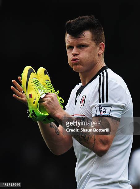 John Arne Riise of Fulham looks dejected after the Barclays Premier League match between Fulham and Everton at Craven Cottage on March 30, 2014 in...