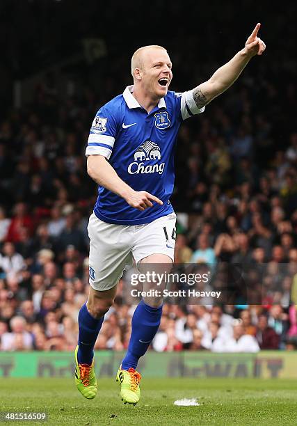 Steven Naismith of Everton celebrates the opening goal, an own goal by David Stockdale of Fulham during the Barclays Premier League match between...