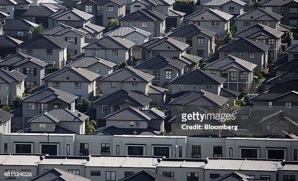 Houses stand in the suburb of Mount Wellington in Auckland, New Zealand, on Monday, July 20, 2015. The Reserve Bank of New Zealand meets Thursday and...
