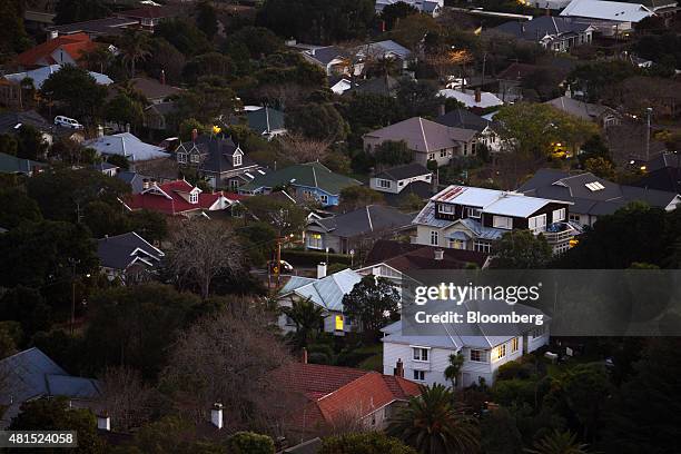 Houses stand in the suburb of Mount Eden at dusk in Auckland, New Zealand, on Monday, July 20, 2015. The Reserve Bank of New Zealand meets Thursday...