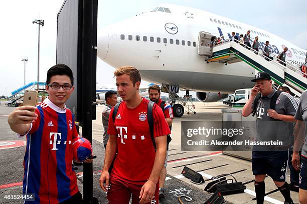 Mario Goetze of FC Bayern Muenchen arrives with the team at Guangzhou International Airport on day 6 of the FC Bayern Audi China Summer Pre-Season...