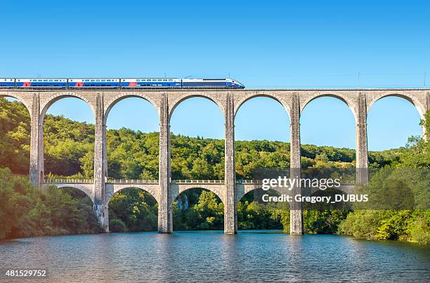 french tgv train on stone viaduct in rhone-alpes france - french landscape stock pictures, royalty-free photos & images