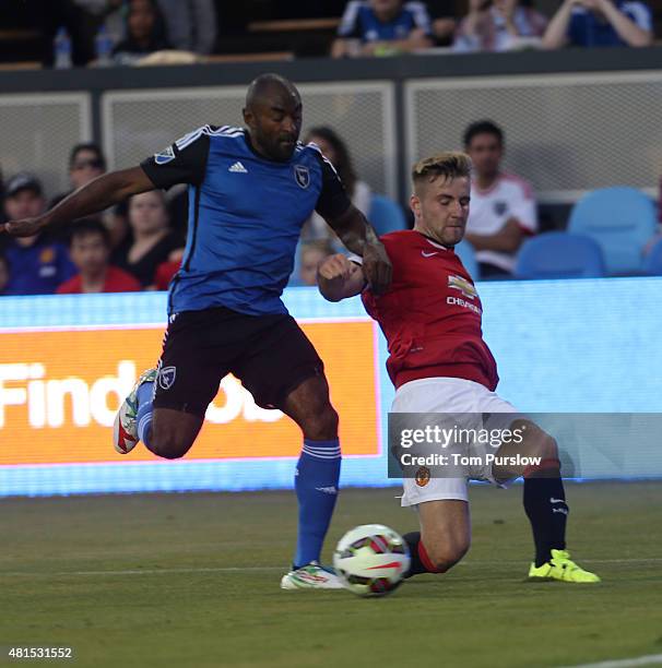 Luke Shaw of Manchester United in action with Marvell Wynne of San Jose Earthquakes during the International Champions Cup 2015 match between San...