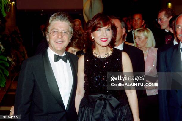 French TV host Denise Fabre and her husband Chef Francis Vandenhende arrive on August 9, 1996 at the annual Rose Ball at the Monte-Carlo Sporting...