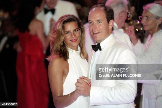 Prince Albert II of Monaco and Princess Stephanie of Monaco dance on August 4, 1995 during the annual Rose Ball at the Monte-Carlo Sporting Club in...