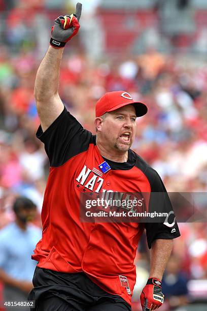 Former Cincinnati Reds and Major League Baseball player Sean Casey reacts after hitting a home run during the 2015 MLB All-Star Legends & Celebrity...