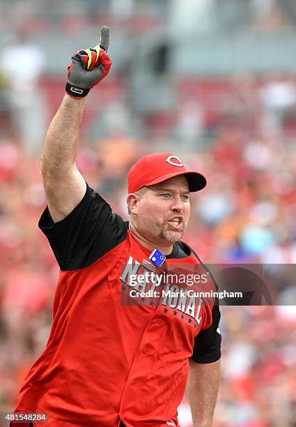 Former Cincinnati Reds and Major League Baseball player Sean Casey reacts after hitting a home run during the 2015 MLB All-Star Legends & Celebrity...