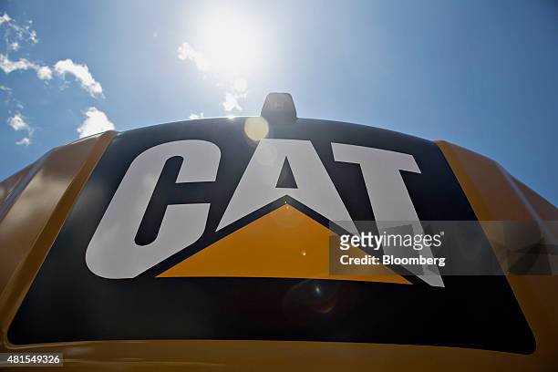 Caterpillar Inc. Logo appears on the back of an excavator at the Altorfer Cat dealership in East Peoria, Illinois, U.S., on Tuesday, July 21, 2015....