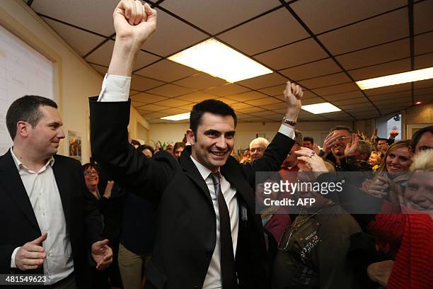 French right wing UMP candidate for the mayoral election in Angouleme, Xavier Bonnefont , reacts after the announcementof results in the second round...
