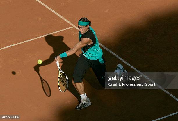 Rafael Nadal of Spain in action against Novak Djokovic of Serbia in their quarter final match, during day five of the ATP Masters Series at the Foro...