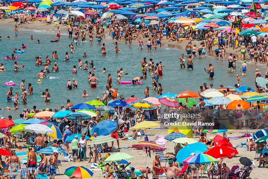 Summer Holiday Season Begins And Tourists Flock To The Beaches In Spain