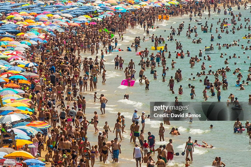 Summer Holiday Season Begins And Tourists Flock To The Beaches In Spain