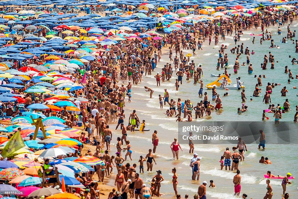 Summer Holiday Season Begins And Tourists Flock To The Beaches In Spain