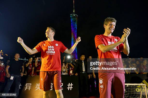 Manuel Neuer of FC Bayern Muenchen and his team mate Thomas Mueller attends a fun football match at adidas marketing event on a cruise boat of the...