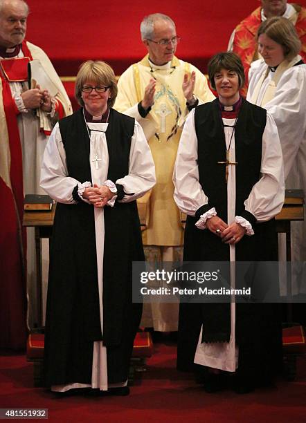 Archbishop of Canterbury, Justin Welby, applauds after presiding over the consecration of Rachel Treweek as the next Bishop of Gloucester and Canon...