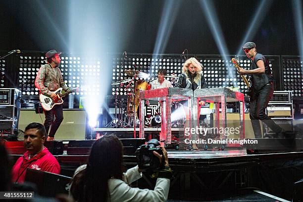 Musicians James Shaw, Joules Scott-Key, Emily Haines, and Joshua Winstead of Metric perform on stage at Viejas Arena on July 21, 2015 in San Diego,...