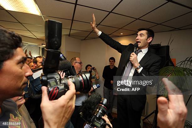 French right wing UMP candidate for the mayoral election in Angouleme, Xavier Bonnefont , speaks to supporters as he reacts after the announcement of...