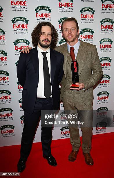 Edgar Wright and Simon Pegg, with the award for Best British Film for 'The World's End' during the Jameson Empire Awards 2014 at the Grosvenor House...