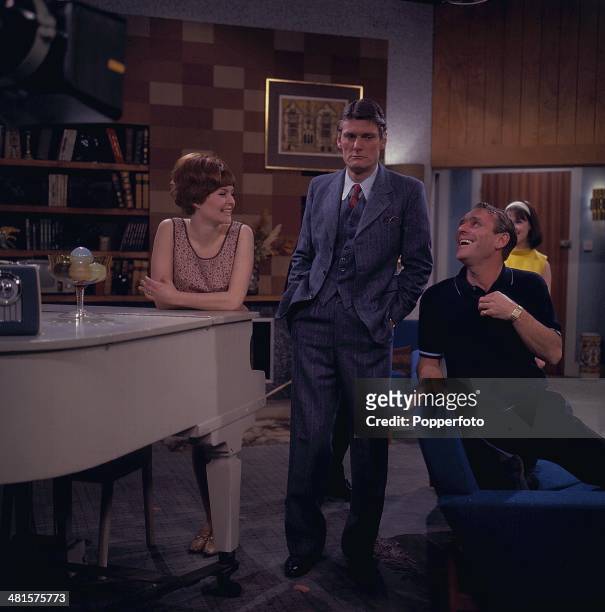 English entertainer Dickie Henderson pictured on right with Pete Murray in centre and actress Isla Blair in a scene from the television sitcom 'The...