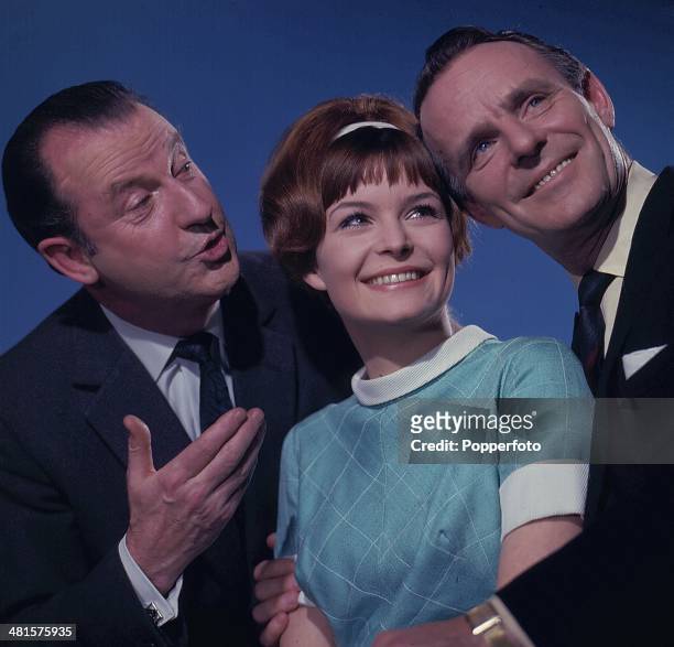 English entertainer Dickie Henderson right pictured with actor Lionel Murton on left and actress Isla Blair centre, in a scene from the television...