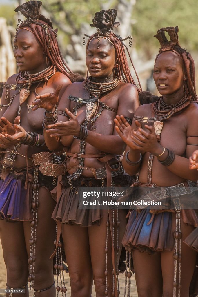 Himba Women Dancing And Clapping Hands.