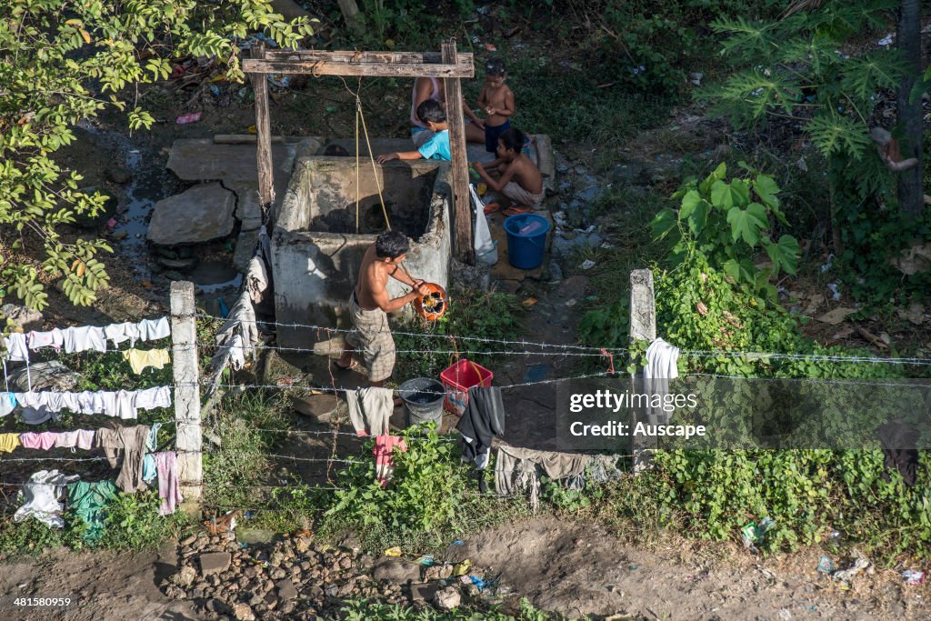 Communal well in a slum, Philippines