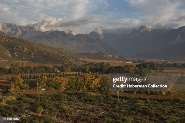 Autumn Coloured Winelands and Vineyards with Mountain Views and Sky in the Hex River Valley Near De Doorns and Worcester in the Western Cape Provence...