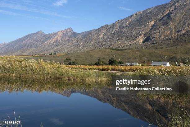 Autumn Coloured Winelands and Vineyards with Mountain Views and Sky in the Hex River Valley Near De Doorns and Worcester in the Western Cape Provence...