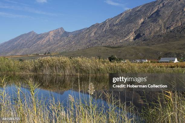 Autumn Coloured Winelands and Vineyards with Mountain Views and Sky in the Hex River Valley Near De Doorns and Worcester in the Western Cape Provence...