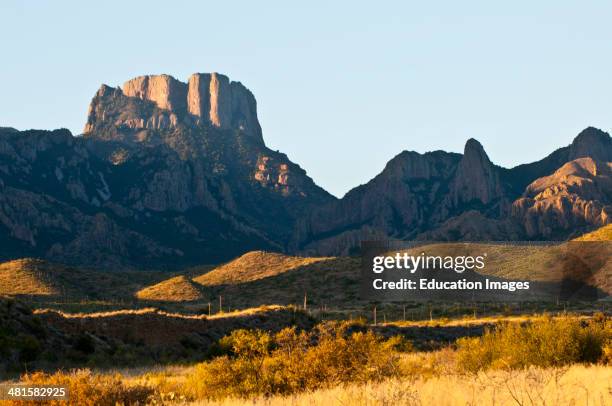 North America, USA, Texas, Big Bend National Park, Chisos Mountains and Casa Grande in evening light from Chisos Basin Road.