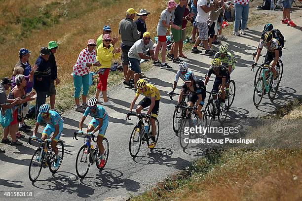 Team Astana and Vincenzo Nibali of Italy riding for Astana Pro Team lead the group of Chris Froome of Great Britain riding for Team Sky in the...