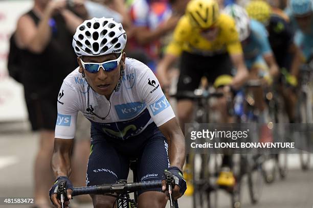 Colombia's Nairo Quintana , wearing the best young's white jersey rides ahead of Great Britain's Christopher Froome, wearing the overall leader's...