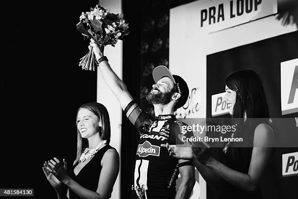 Simon Geschke of Germany and Team Giant-Alpecin celebrates on the podium after winning Stage Seventeen of the 2015 Tour de France, a 161km stage...