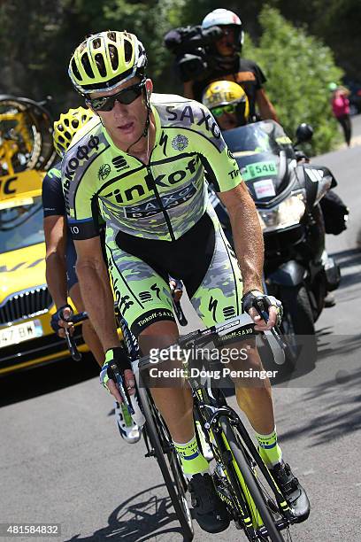 Michael Rogers of Australia riding for Tinkoff-Saxo attacks of the front of the group of the yellow jersey on the climb of the Col de la...