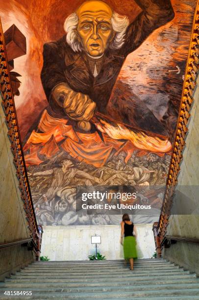 Mexico Jalisco Guadalajara Palacio Gobierno or Government Palace Mural of Fr Miguel Hidalgo by Jose Orozco in 1937 with staircase & figure.