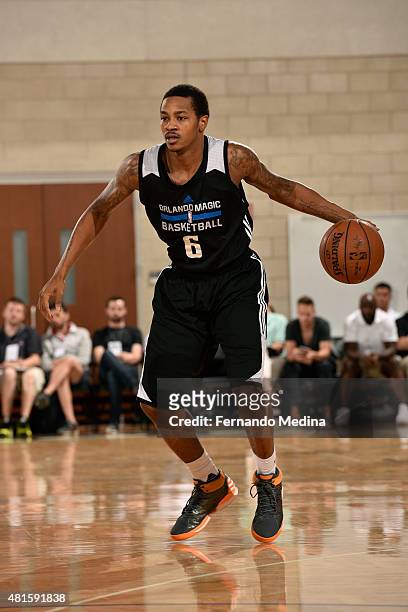 Keith Appling of the Orlando Magic-White dribbles the ball against the Memphis Grizzlies during the Orlando Summer League on July 8, 2015 at Amway...