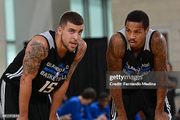 Scottie Wilbekin and Keith Appling of the Orlando Magic-White talk during the game against the Memphis Grizzlies during the Orlando Summer League on...