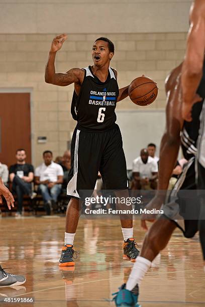 Keith Appling of the Orlando Magic-White dribbles the ball against the Memphis Grizzlies during the Orlando Summer League on July 8, 2015 at Amway...