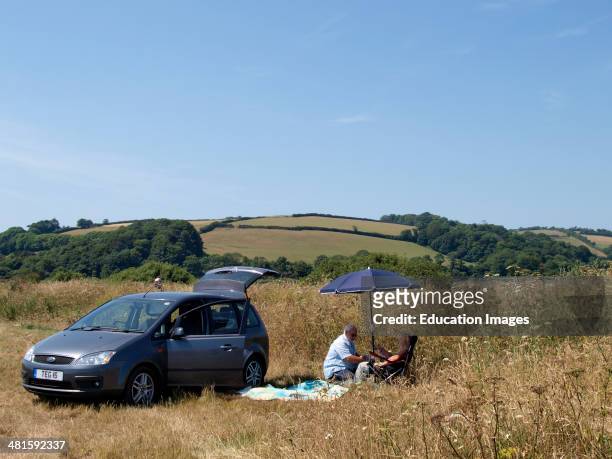 Couple having a picnic, Devon, UK.
