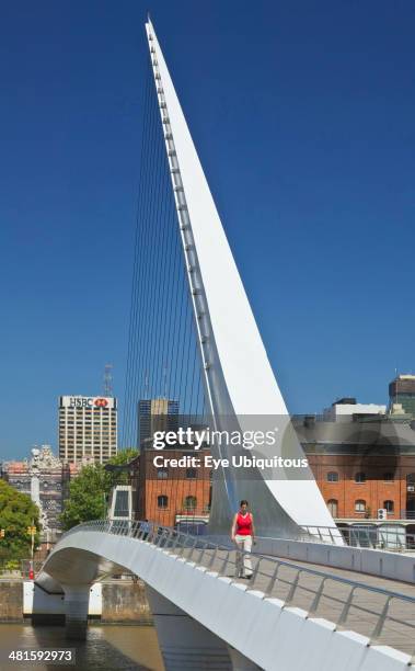 Argentina, Buenos Aires, Puerto Madero, Puente de la Mujer. A Cantilever spar cable-stayed footbridge that is also a swing bridge.