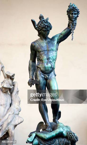 Italy, Tuscany, Florence, The copy of the 1554 bronze statue of Perseus holding Medusas head by Cellini in the Loggia del Lanzi, or Loggia di Orcagna...