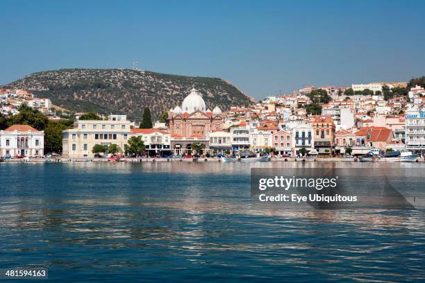 Greece, North East Aegean, Lesvos Island, Mitilini harbor with the sea at the foreground and blue sky