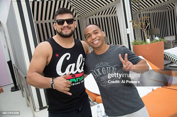 Kelvin Gastelum and John Dodson take a photo during the Foxtail pool party at SLS Las Vegas during UFC International Fight Week on July 9, 2015 in...