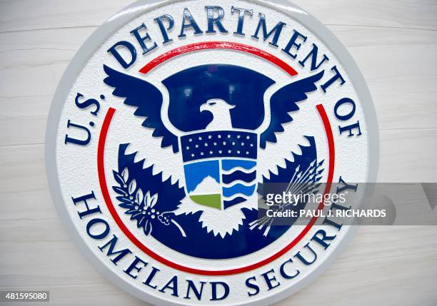 The Department of Homeland Security logo is seen at the new ICE Cyber Crimes Center expanded facilities in Fairfax, Virginia July 22, 2015. The...
