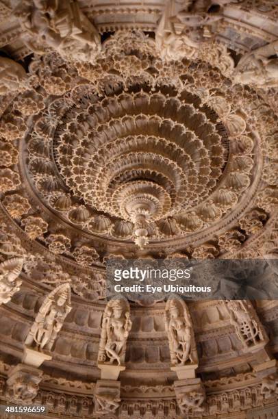 India, Rajasthan, Mount Abu, Dilwara Temples. Vimal Vasahi Jain temple 1031 A.D. Detail of carved white marble central ceiling with central pendant...
