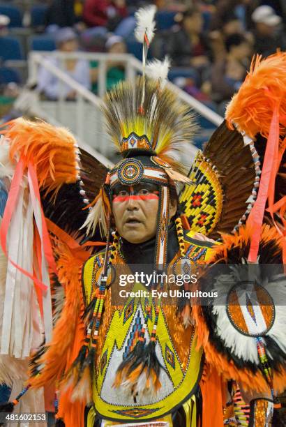 Canada, Alberta, Lethbridge, International Peace Pow Wow Blackfeet Indian from Browning Montana in full costume with feather headdress and bustle...