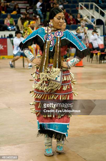Canada, Alberta, Lethbridge, International Peace Pow Wow North American Indian in Ladies Jingle Dance competition.